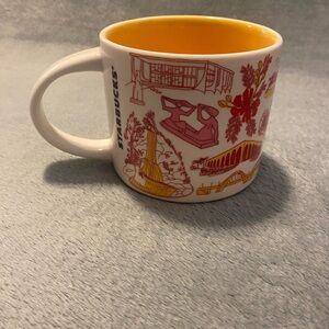 Starbucks Mug with Orange Interior and Illustrated Design